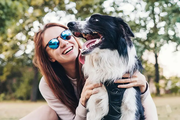 young woman and a dog