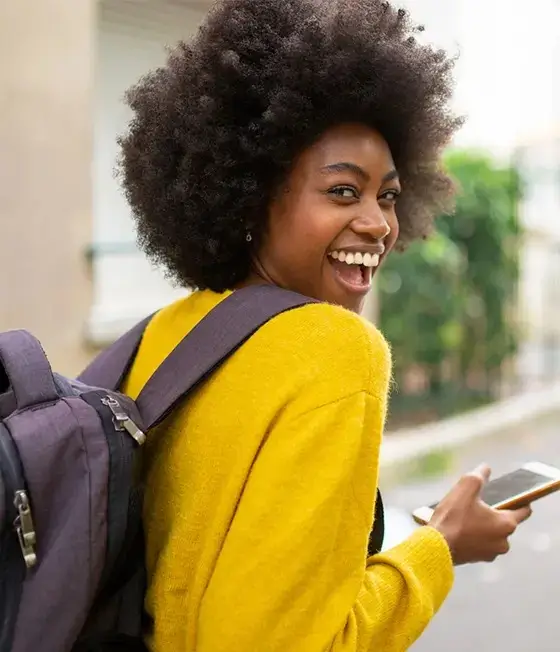 young woman walking to class